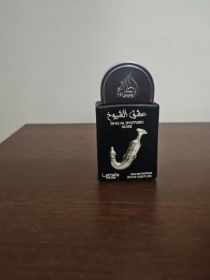 Lattafa Pride Ishq Al Shuyukh Silver Parfym - Endast testad och 20 ml.