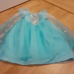 Elsa klänning storlek 110/116
