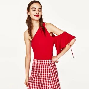 Zara red one shoulder bodysuit - ZARA red one shoulder bodysuit. Completely stretchable New with tags. Size M  Pick up available in Kungsholmen  Please check out my other items! :) 
