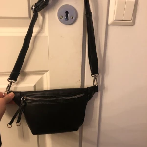 Väska  - En svart väska oanvänd 