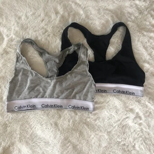 Calvin Klein Toppar - Två stycken. Har endast använt den grå dock