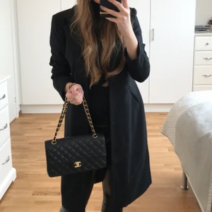 NAKD kappa - Svart kappa från NAKD. https://www.na-kd.com/en/outerwear/coats/the-coat-black-1
