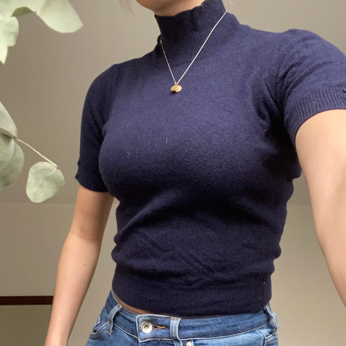 Stickad marinblå polo