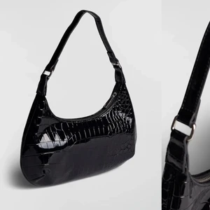 Väska - Aldrig använd då jag har en likadan. Ser ut exakt som den på bilden fast utan metallsakerna. Skriv för mer bilder!