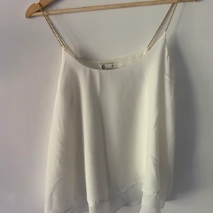 Linne med guldkedja som band - Från cubus, mycket sparsamt använd!