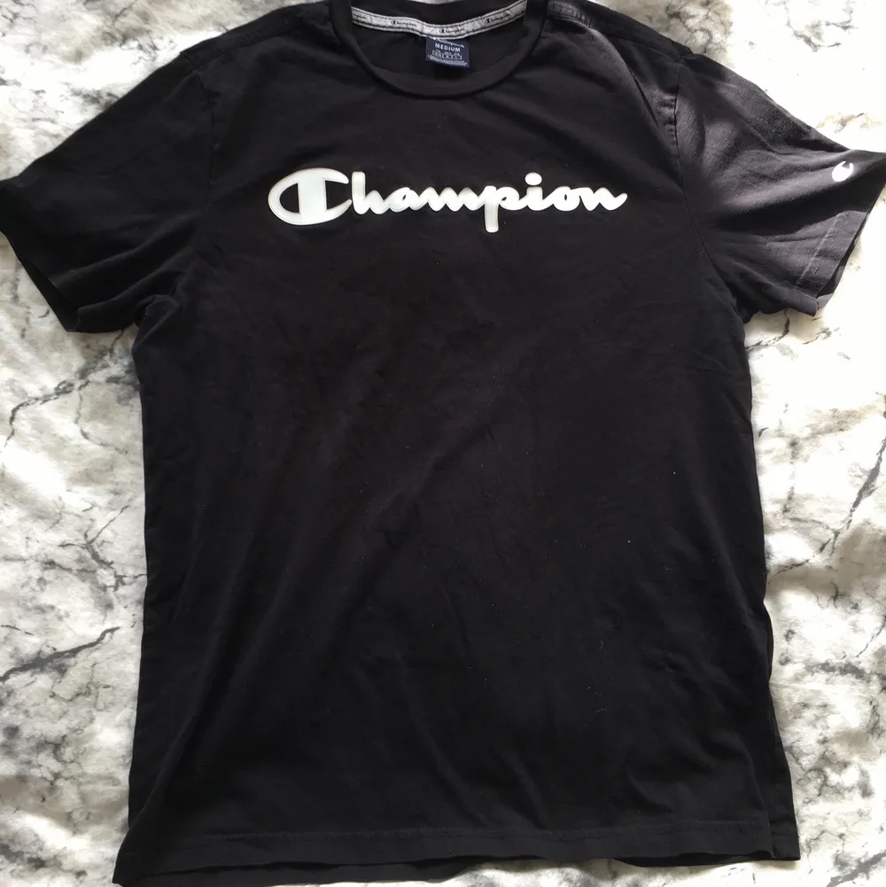 Champion tshirt. T-shirts.