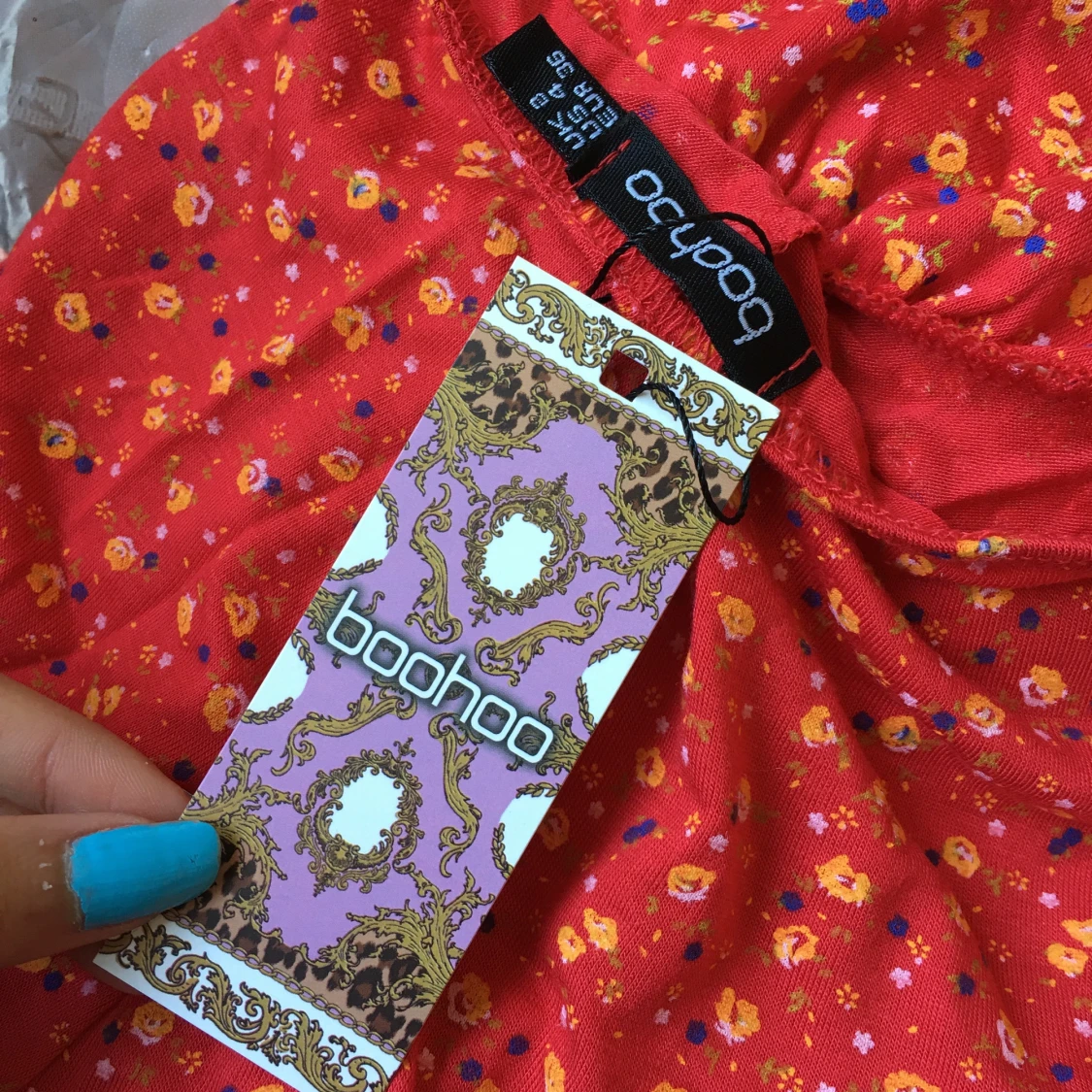 Blommig playsuit med halterneck  - 90