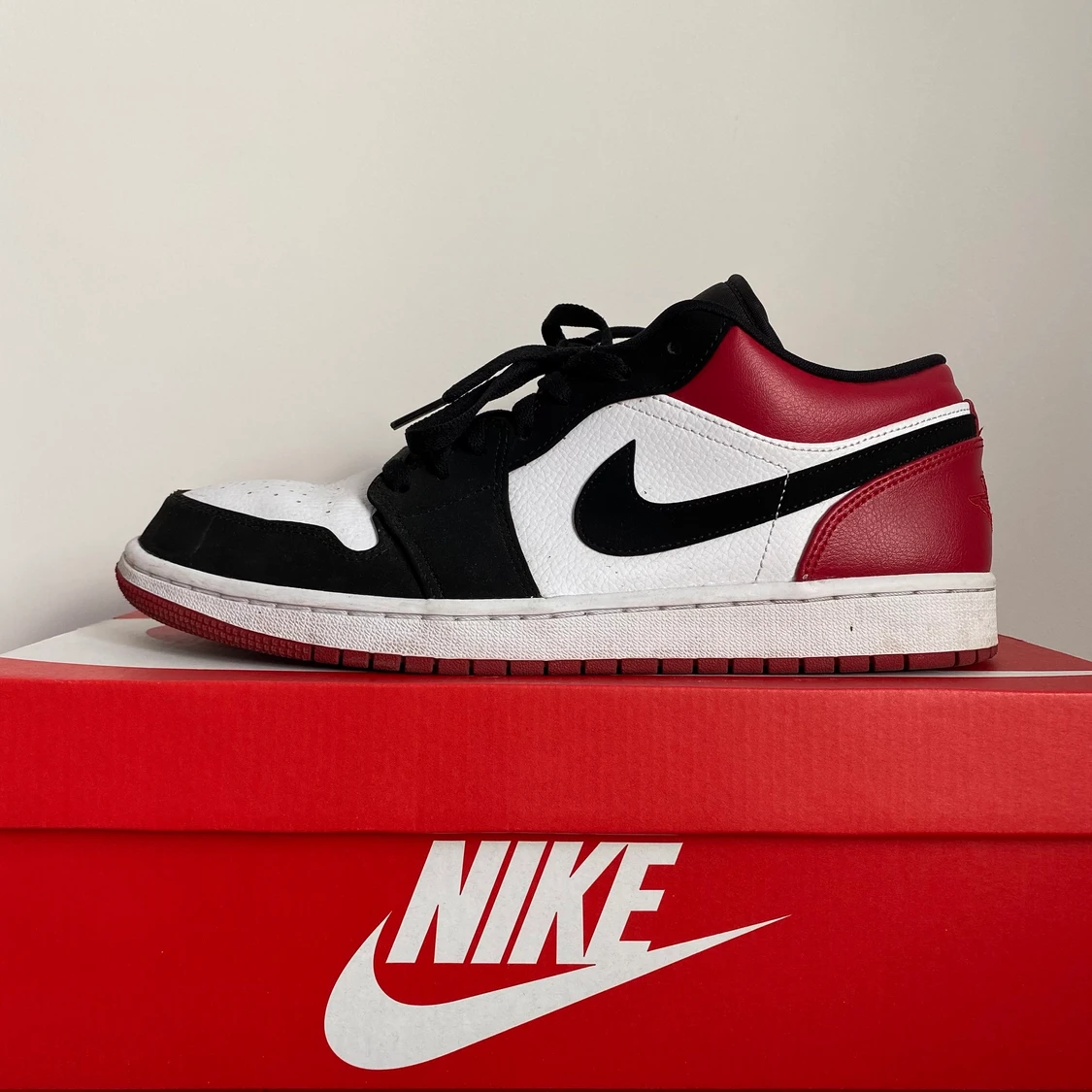 Jordan 1 Low Black Toe - 91
