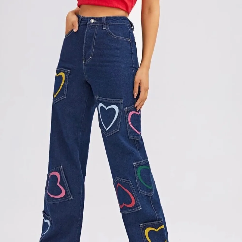 Cute, baggy pants with heart covered pockets❤️. Jeans & Byxor.