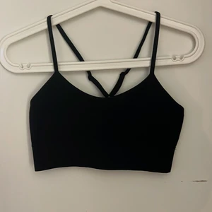 Svart bralette - En svart stretchig bralette från Anna Field i storlek M/L