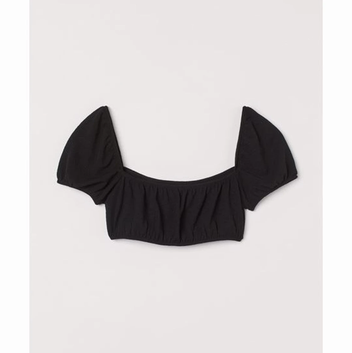 Svart topp med puffärm storlek xs