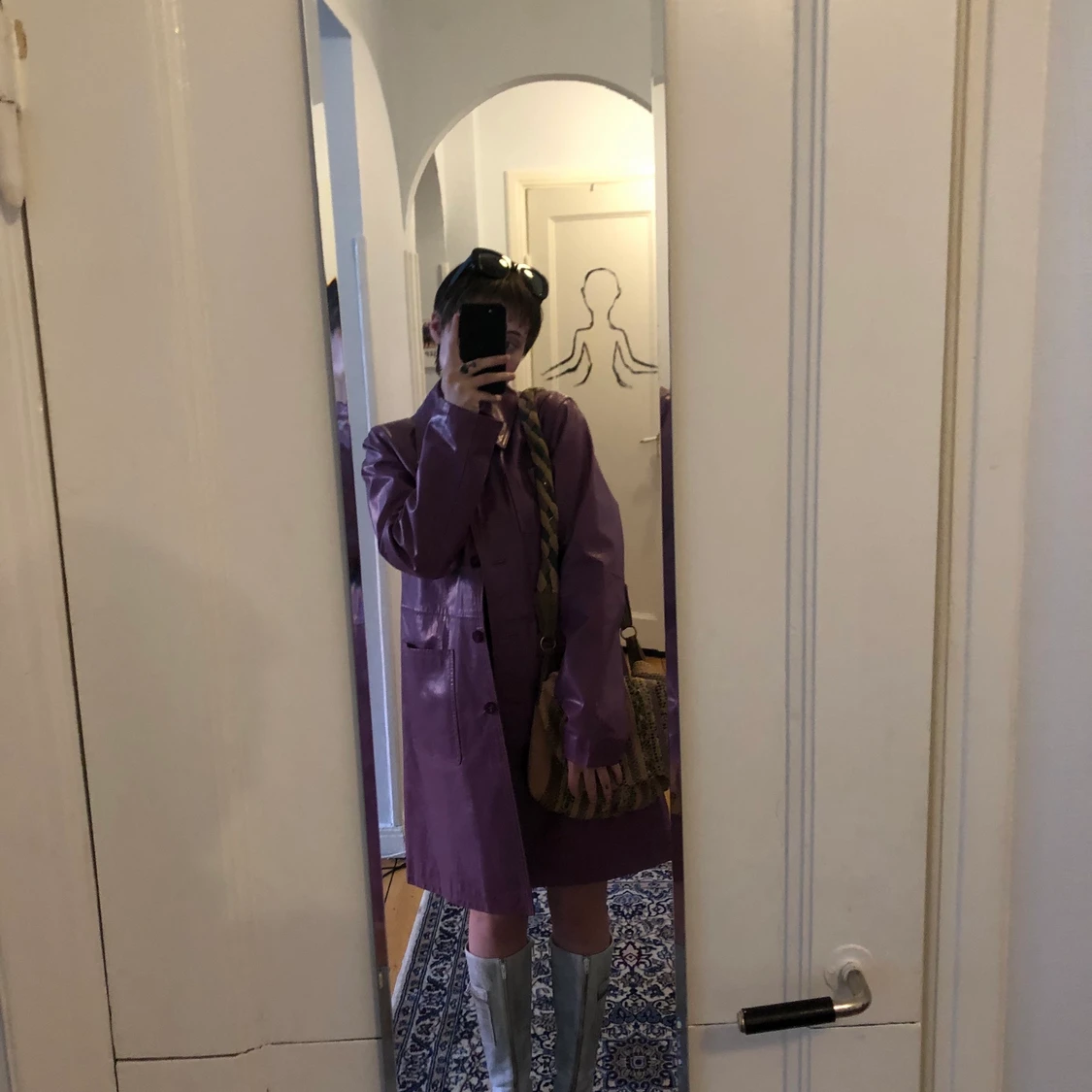 Lila läderkappa - 91