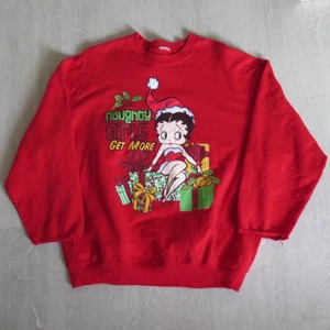 Betty Boop sweatshirt - Betty Boop sweatshirt uppskattad strl L/XL. Passar bra som oversize om man har mindre strl :) 66 kr spårbar frakt.  Skicka meddelande vid frågor/fler bilder! Notera att en liten bit av ärmarna klippts av.  Notera att små defekter kan finnas då den inte är ny. Större brister nämns tydligt i annonsen/visas på bild. OBS! Bud är bindande!!!!!!!  