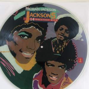 Pictueredisc vinyl med jackson 5s greatest hits. Skivan funkar både på spelaren och på väggen 