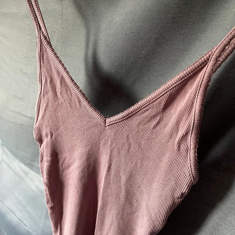 Dusty pink top in size XS, in good condition. . Toppar.