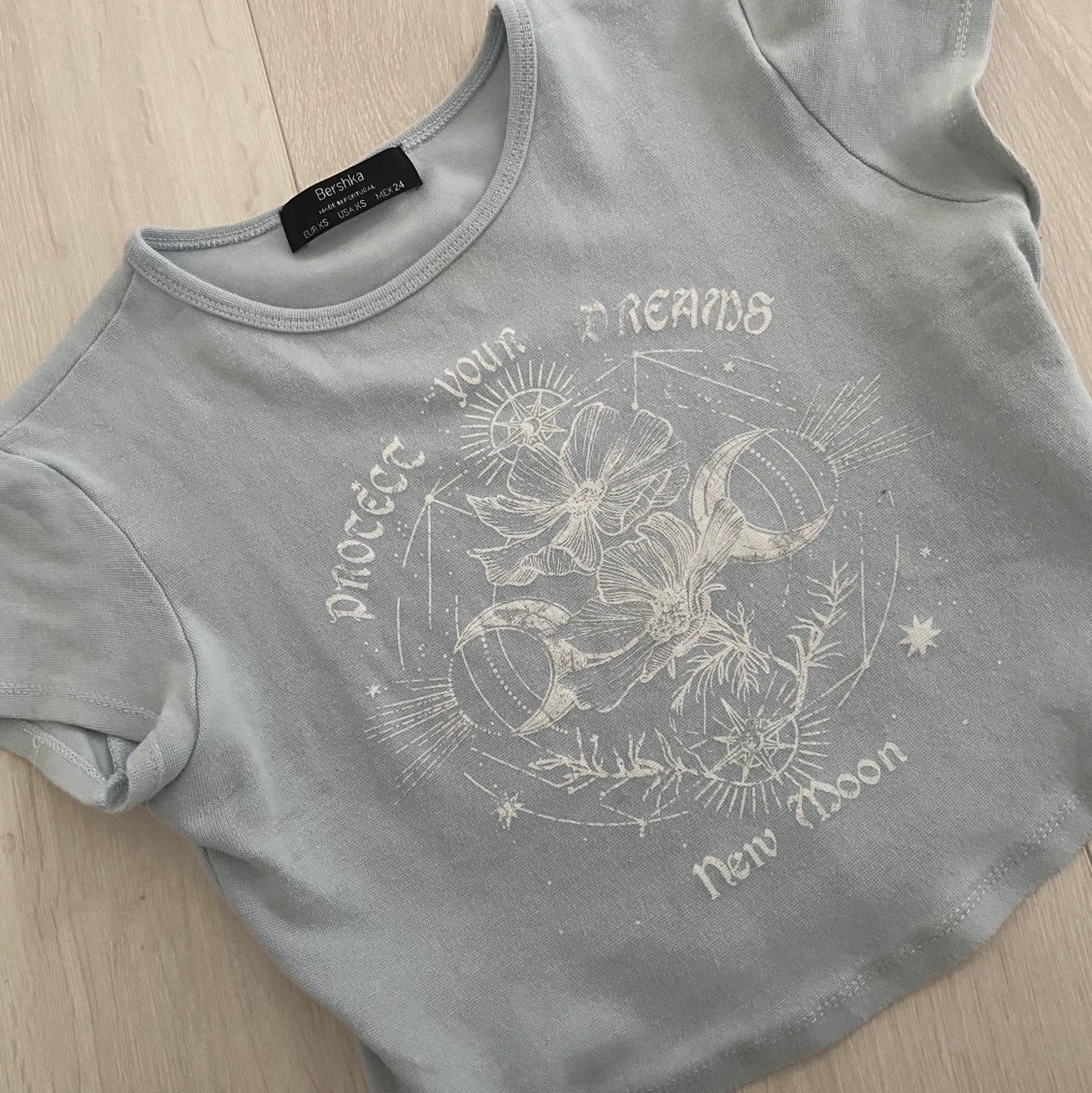 Ljusblå croptop med tryck