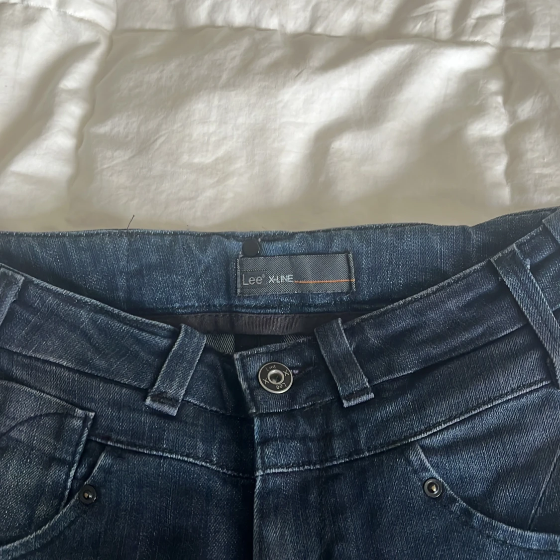 Mörkblå jeans från Lee X-Line W26 - 2