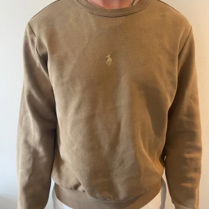 Beige, brun sweatshirt från Polo Ralph Lauren - Riktigt snygg beige brun tröja från Polo Ralph Lauren