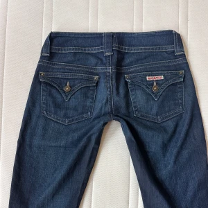 Lågmidjade bootcut jeans - Swisha direkt=billigare utan Plicks avgifter! Vintage från Hudson, uttöjda bak (se bild)💓midja 40 innerben 79 jae 165