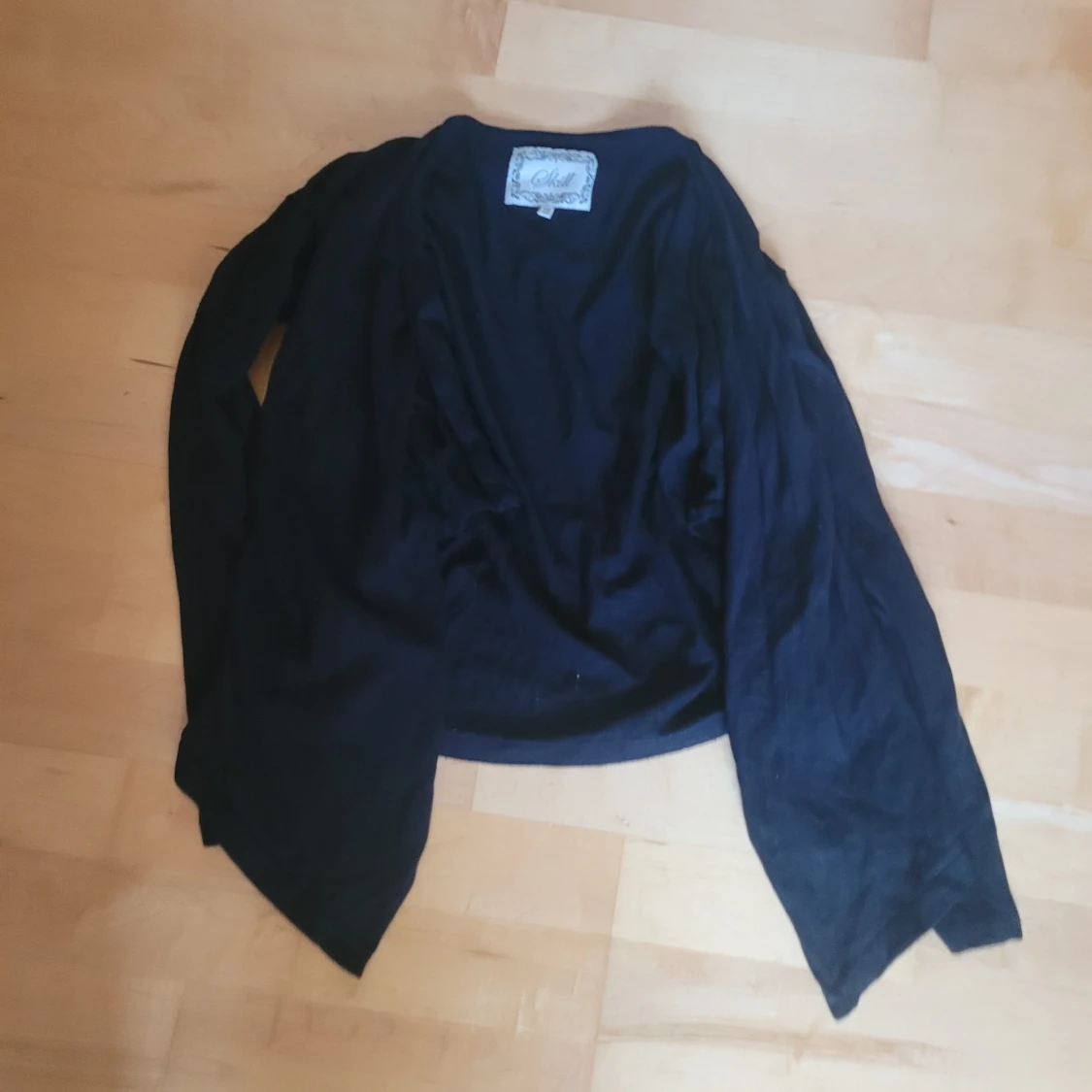 Svart kofta från Skill