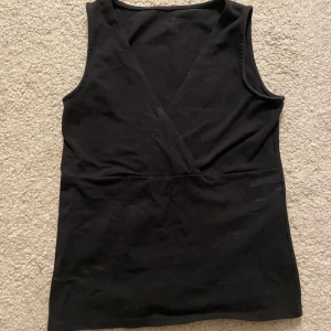 Svart omlottlinne från Brandy Melville - Söt topp från Brandy melville som jag aldrig använt💕