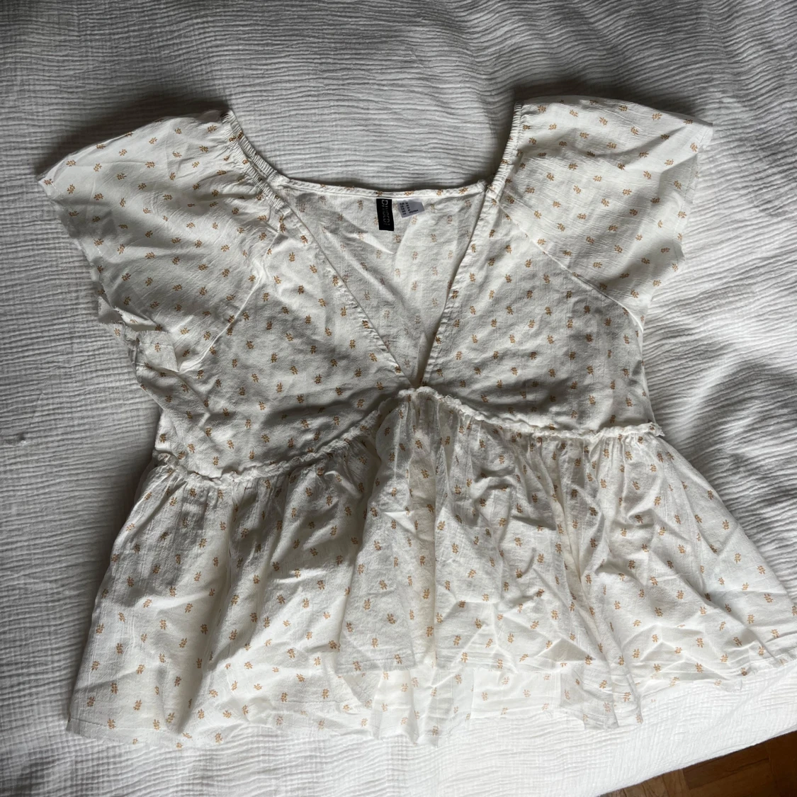 Vit blommig blus från H&M