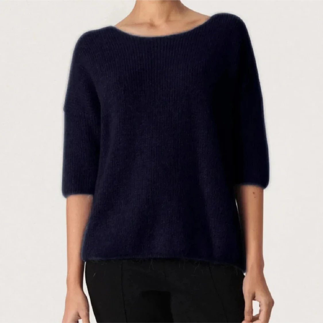 Trekvartsärmad stickad tröja