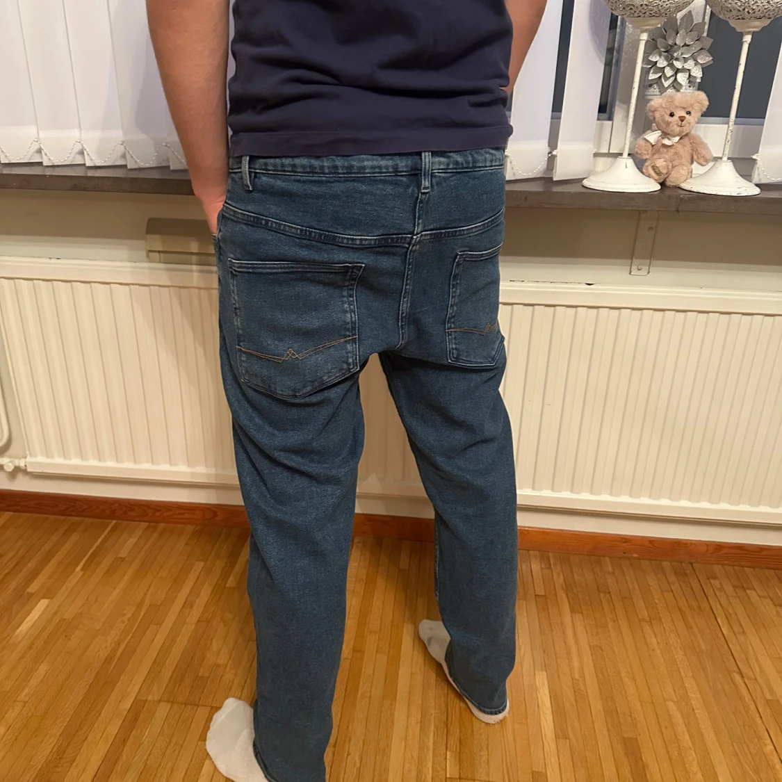 Blå jeansbyxor herr