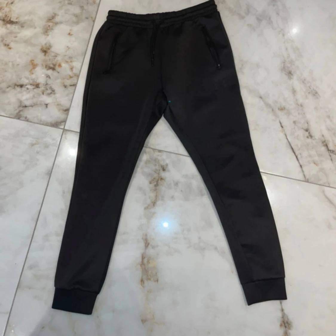 Svart tracksuit Under Armour - 3