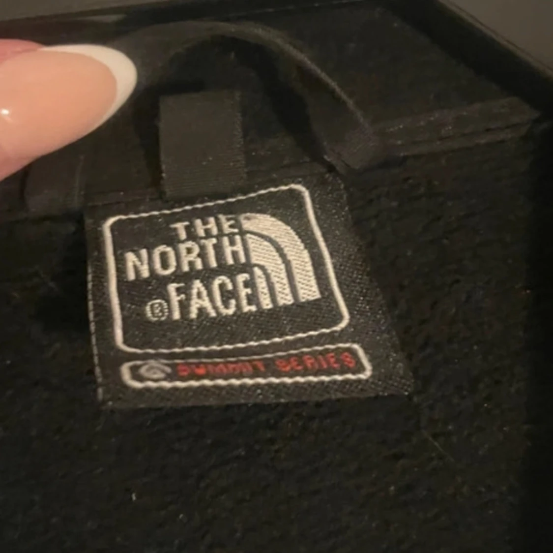 Svart jacka från The North Face Summit Series - 2