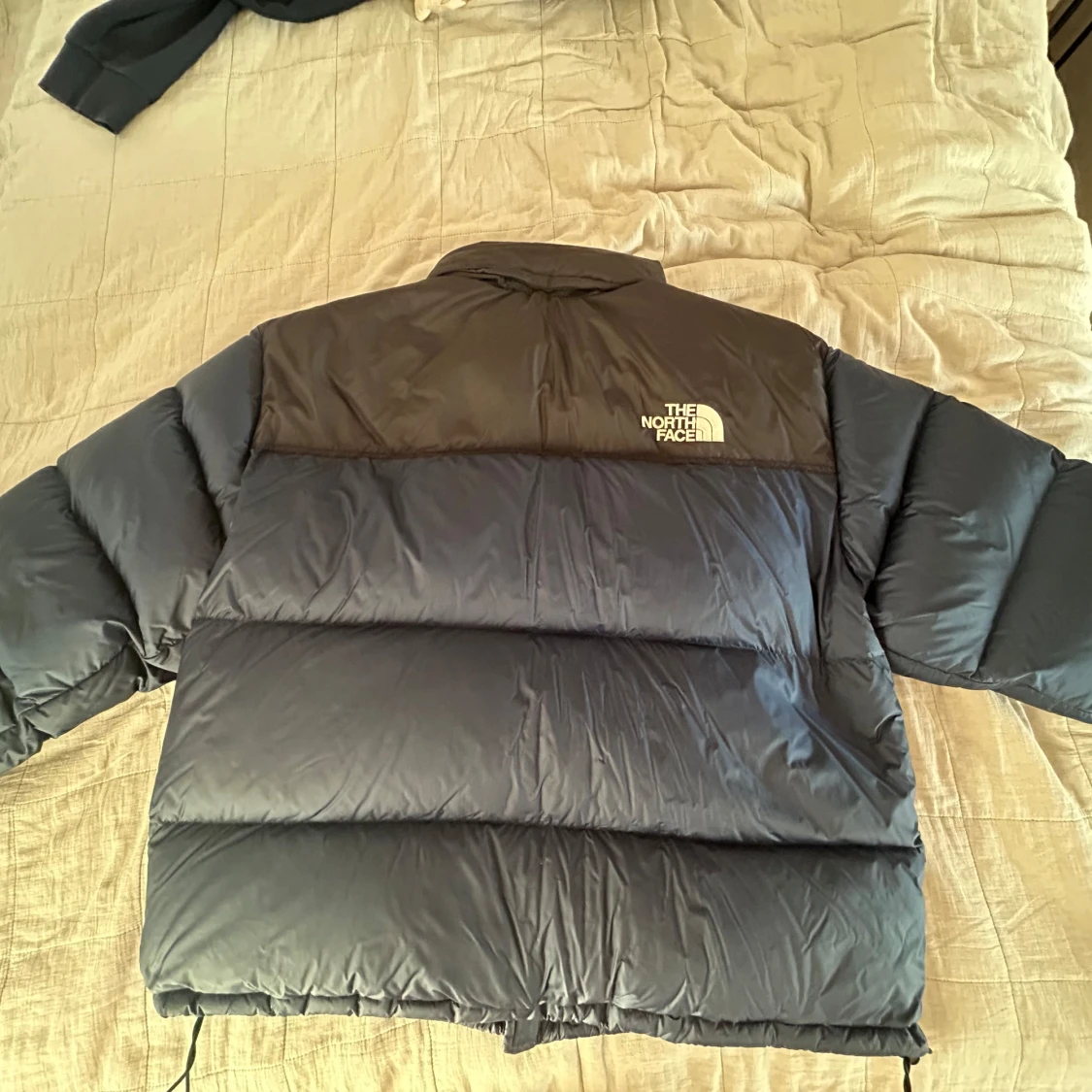 Blå dunjacka från The North Face - 1