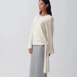 Vit stickad tröja med knyt i sidan - SÖKER!!! I storlek xs