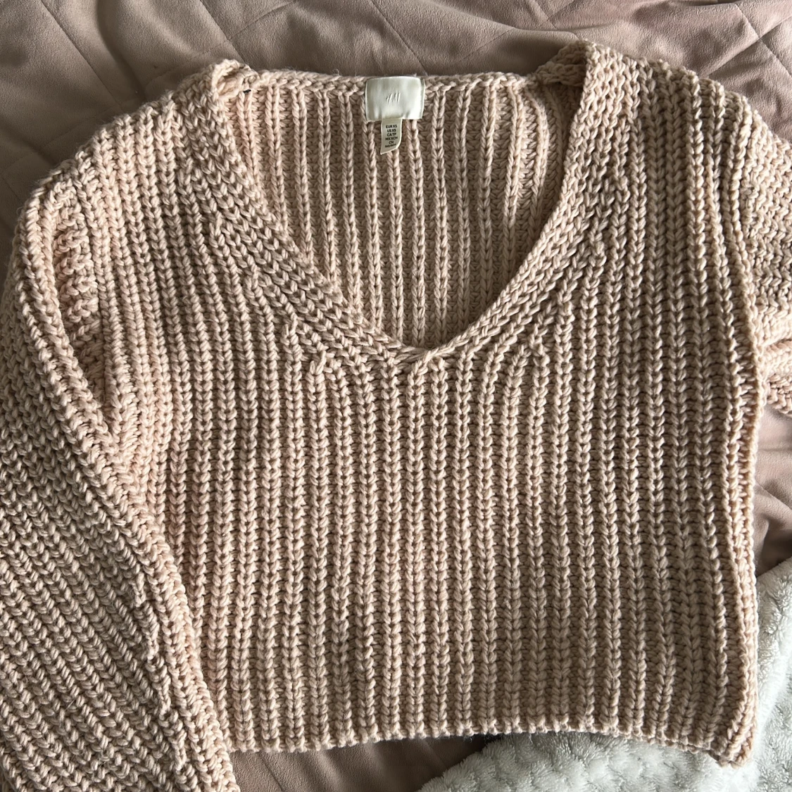 Kabelstickad tröja