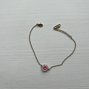 Lily&rose armband - Armband från Lily and Rose i guld och rosa