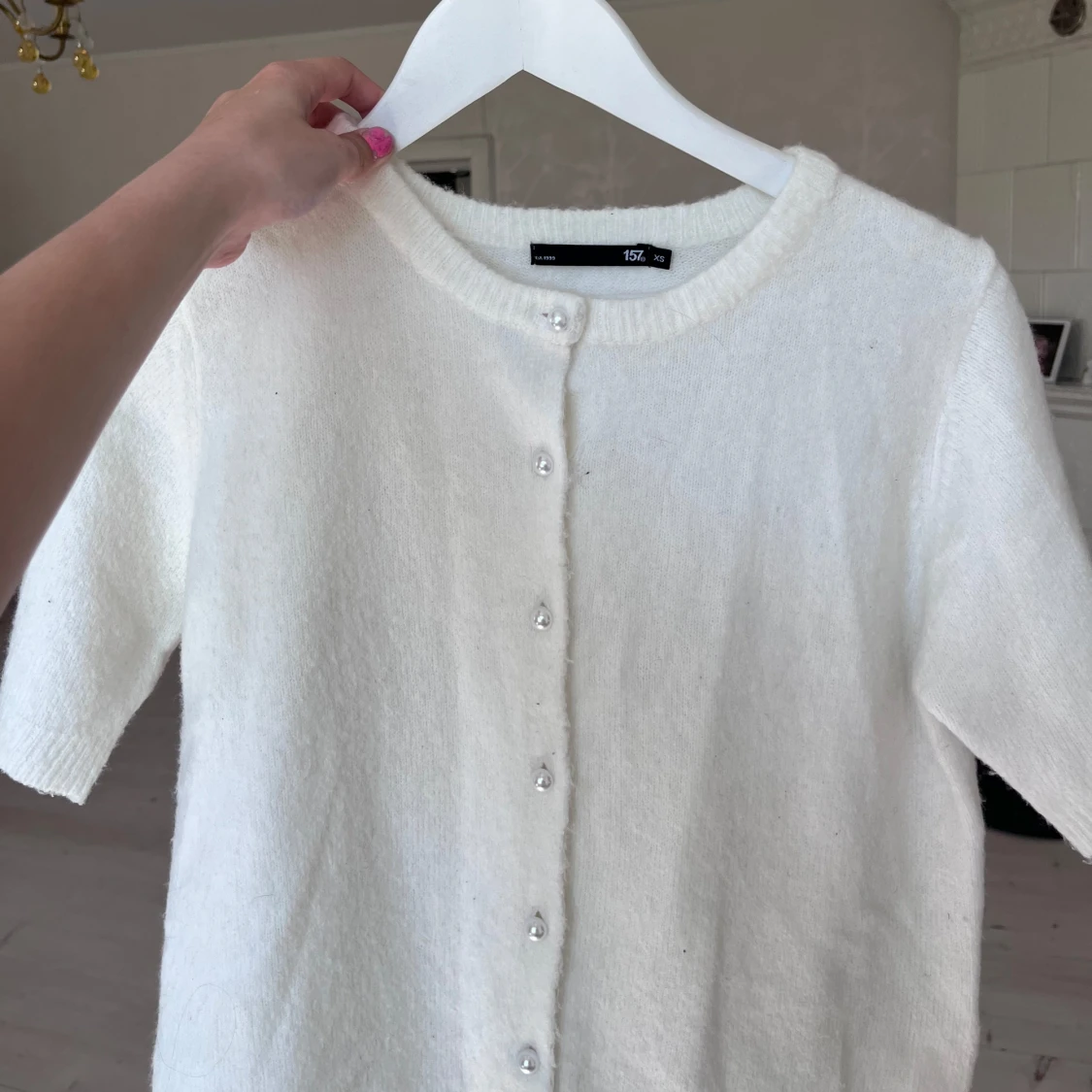 Vit kofta med pärlknappar XS - 2