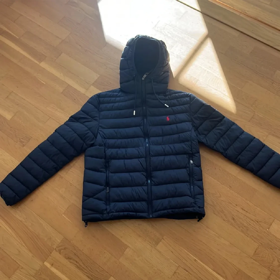 Mörkblå dunjacka från Polo Ralph Lauren