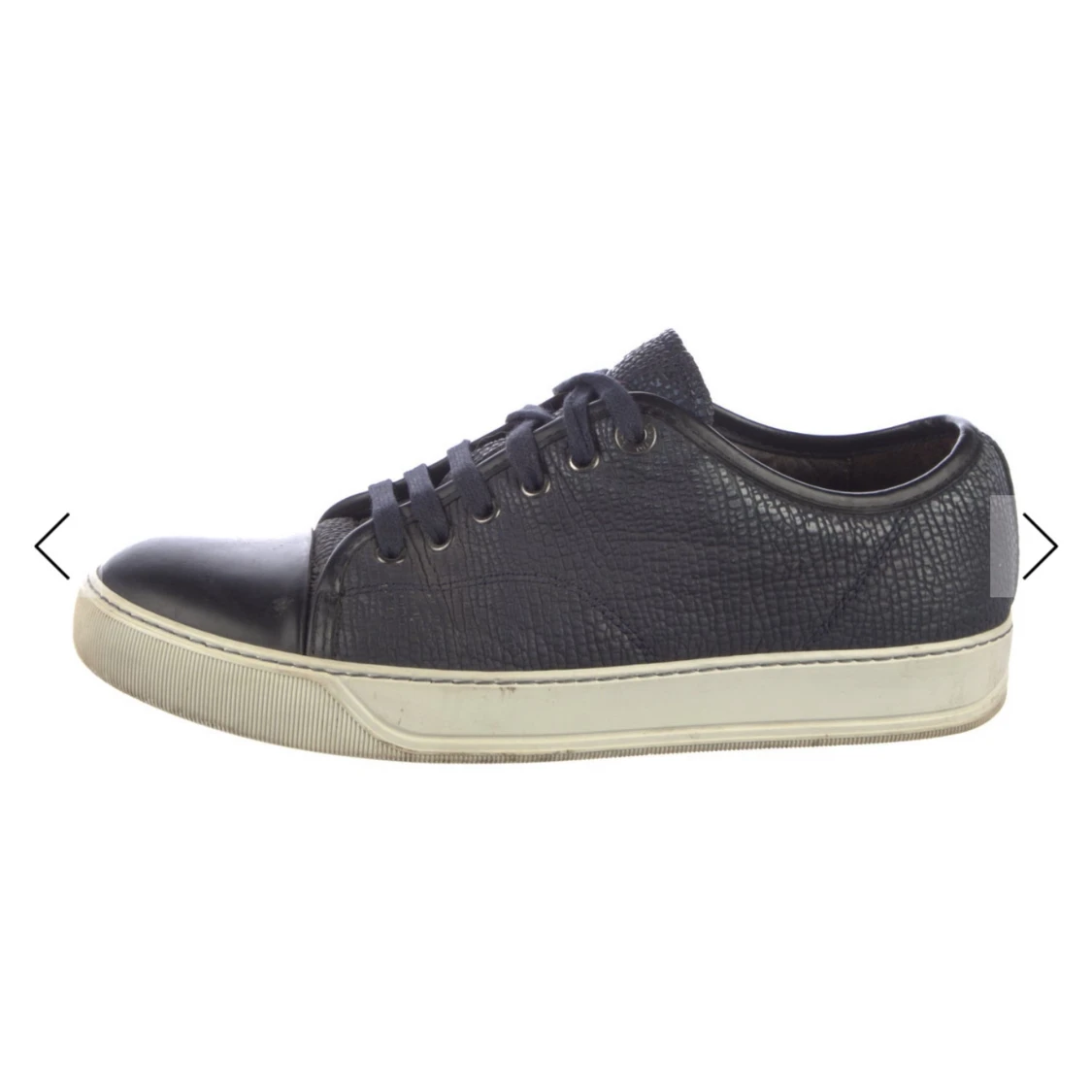 Lanvin Svarta sneakers i skinn med vit sula