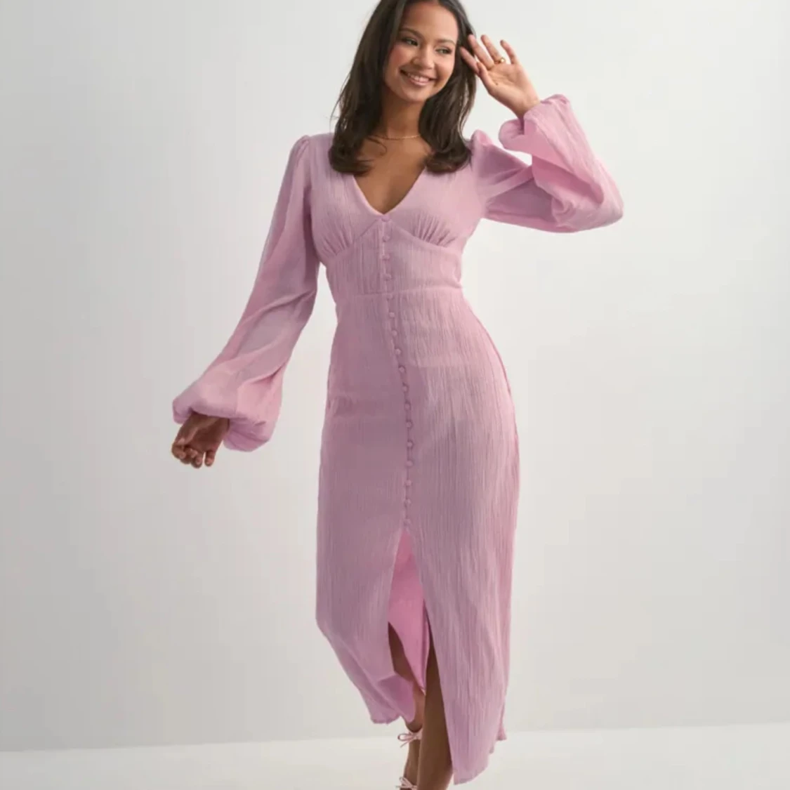 Ljusrosa långklänning med knappar