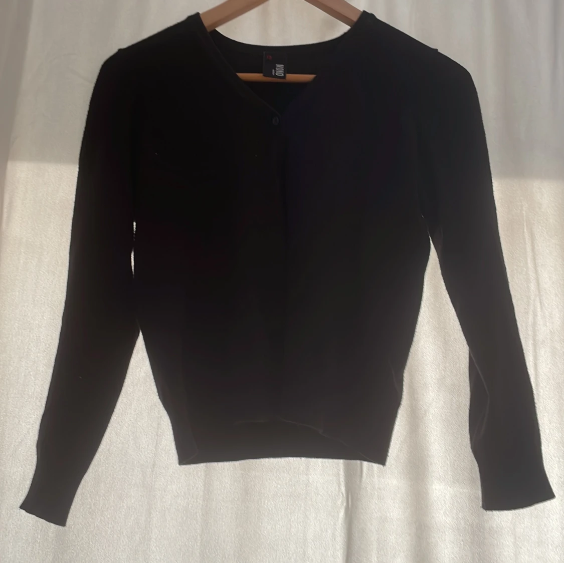 Svart kofta från MONO