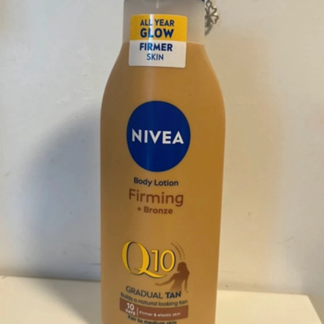 NIVEA Q10 Firming + Bronze lotion