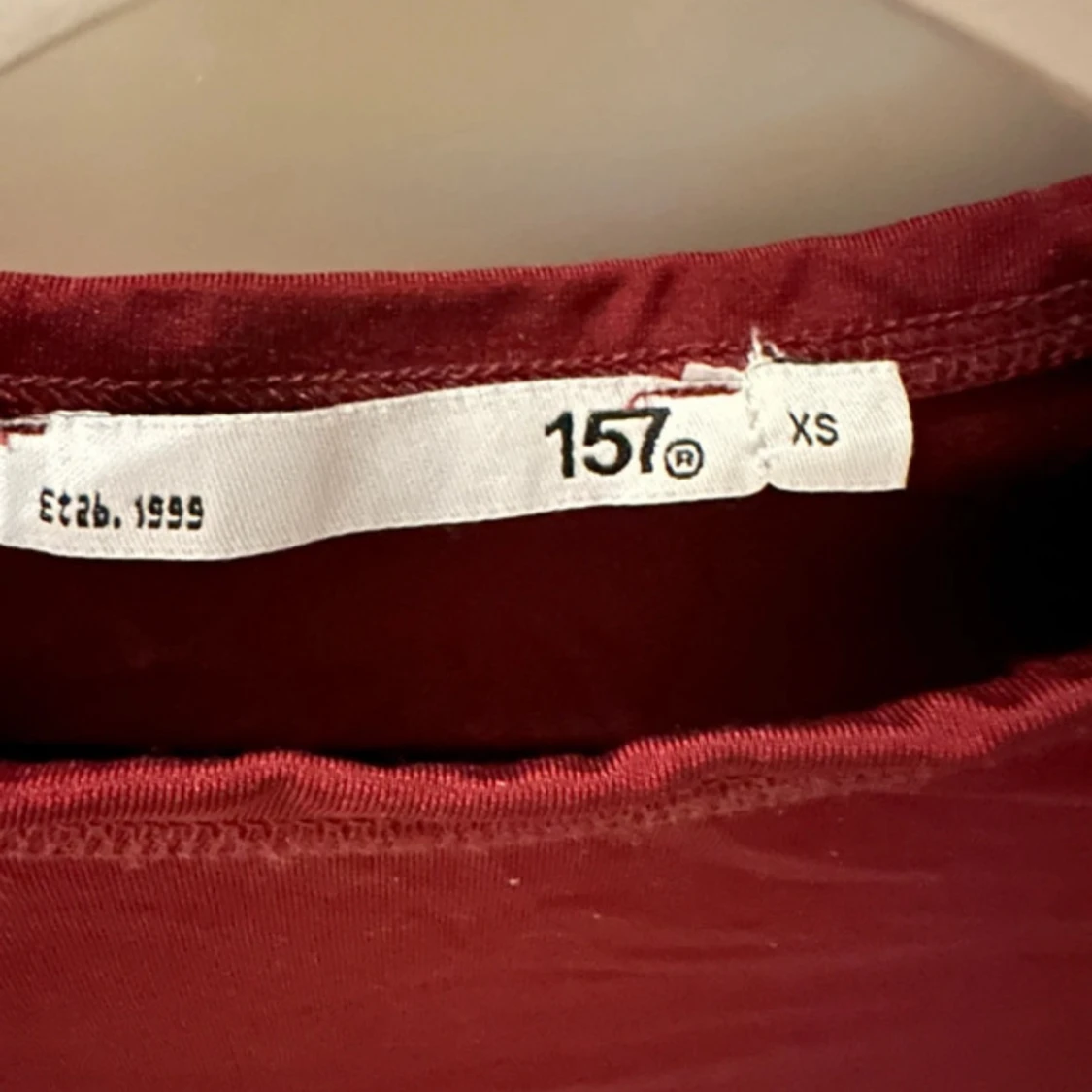 Vinröd långärmad topp från 157 - 2