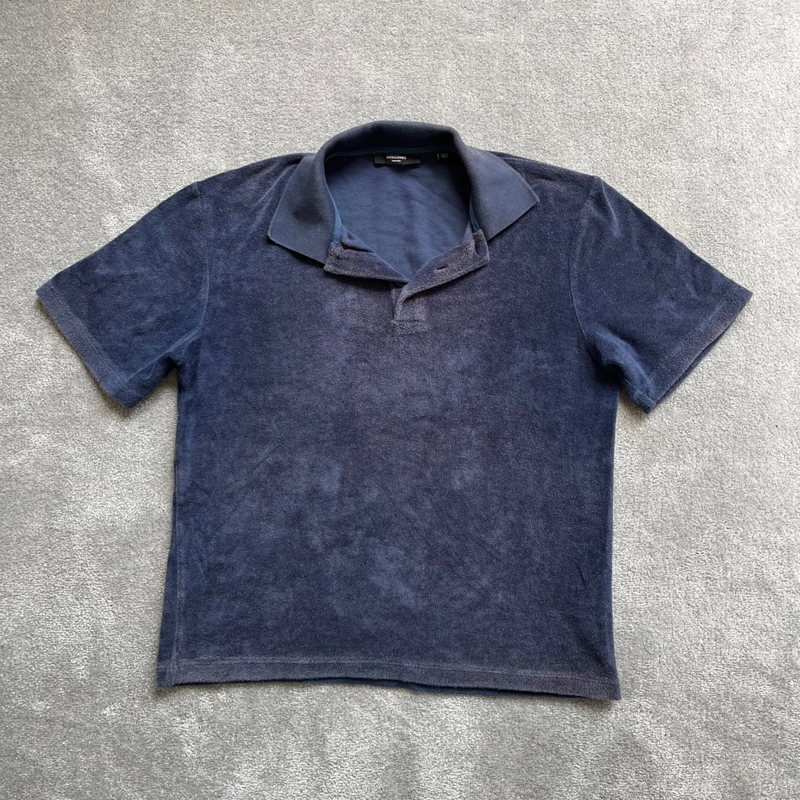 Mörkblå frotté pikétröja