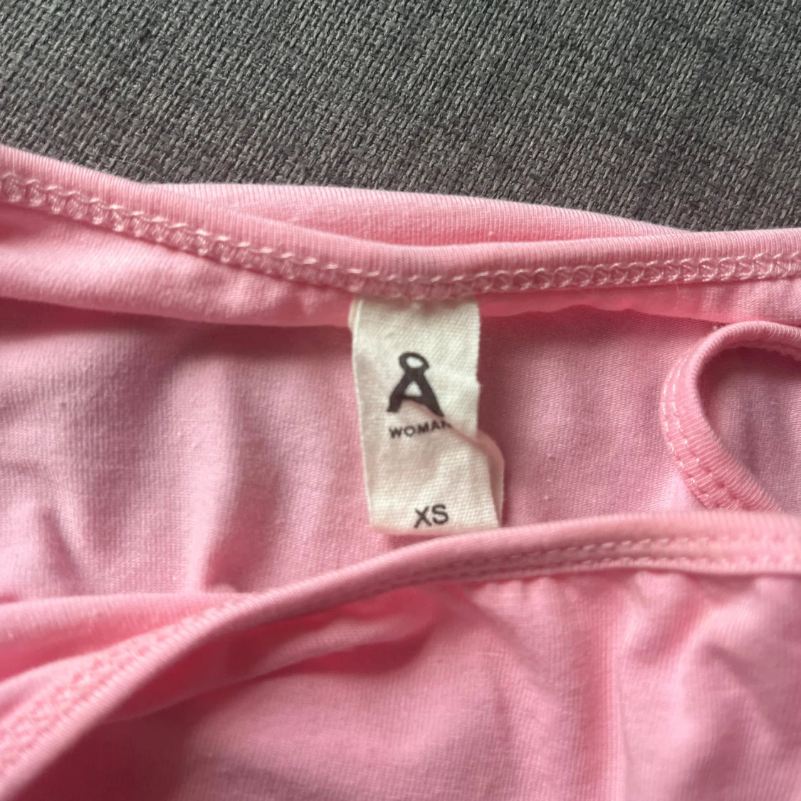 Ljusrosa linnetopp från Åhléns XS - 3