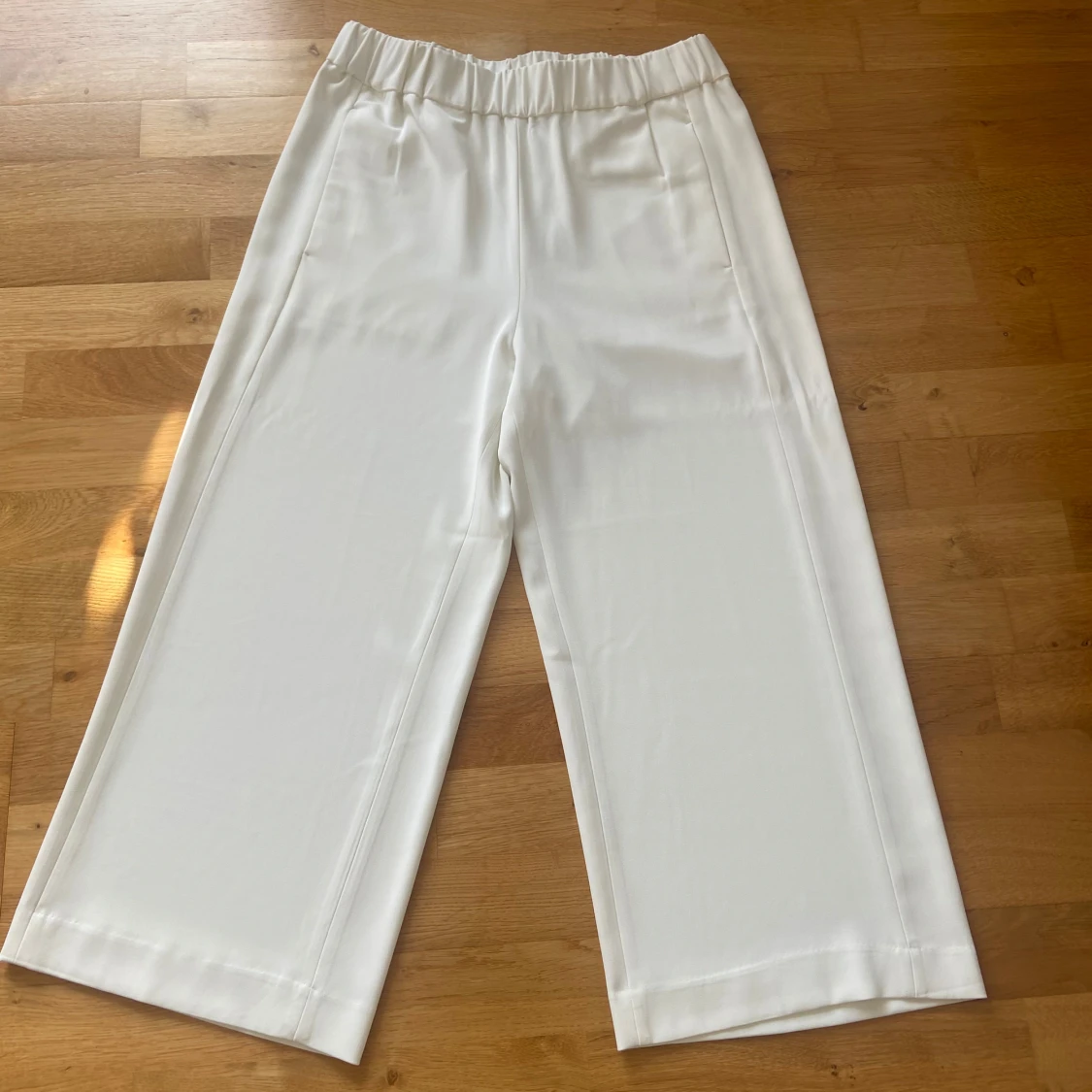 Vita wide byxor från H&M, strl 40