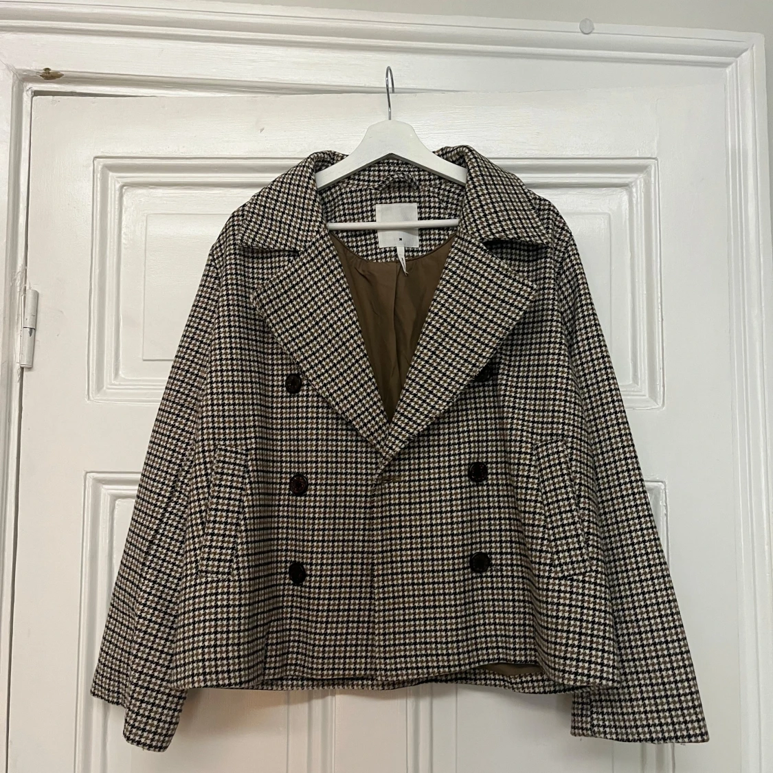 Rutig kort kappa från Object