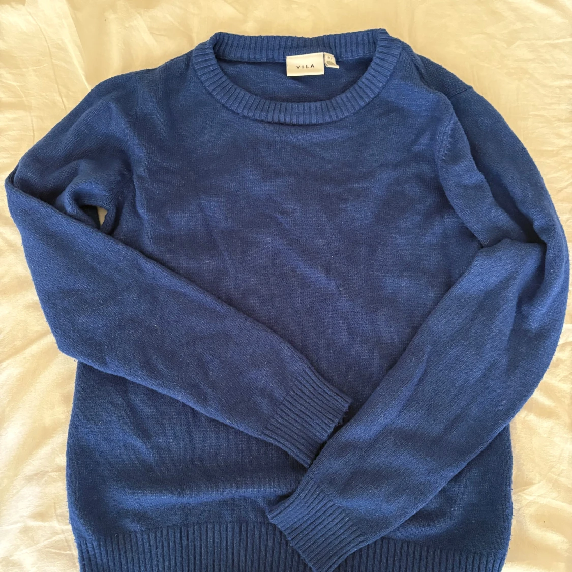 Blå stickad tröja från Vila