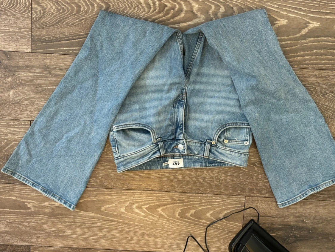 Ljusblå slitna bootcut jeans - 1