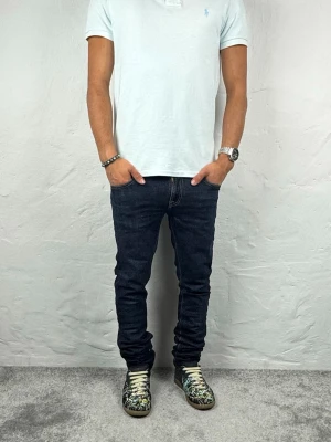Nudie jeans  - Ett par riktigt snygga jeans från Nudie i storlek W28 L32 i modellen Tight Long John 