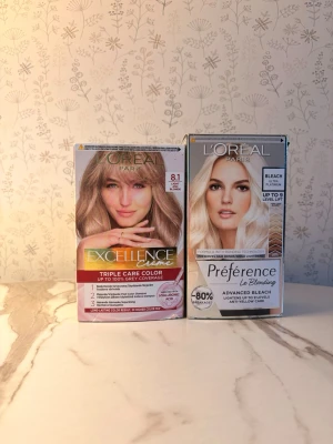 L'Oréal Paris hårfärg & blekning - Man kan välja att endast köpa 1 av varorna. Säljer två hårprodukter från L'Oréal Paris: Excellence Crème 8.1 Ljusblond ask och Préférence Le Blonding Advanced Bleach. Perfekt för dig som vill färga eller bleka håret hemma. Båda produkterna ger ett naturligt blont resultat och innehåller vårdande ingredienser.