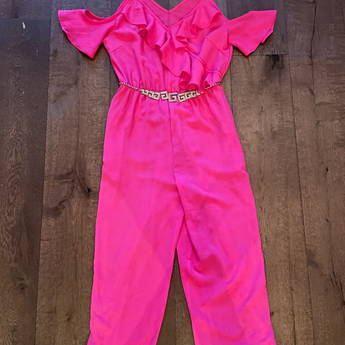 Rosa byxdress med strassdetalj